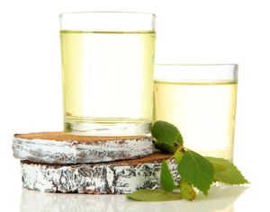 Glasses of birch sap, isolated on white